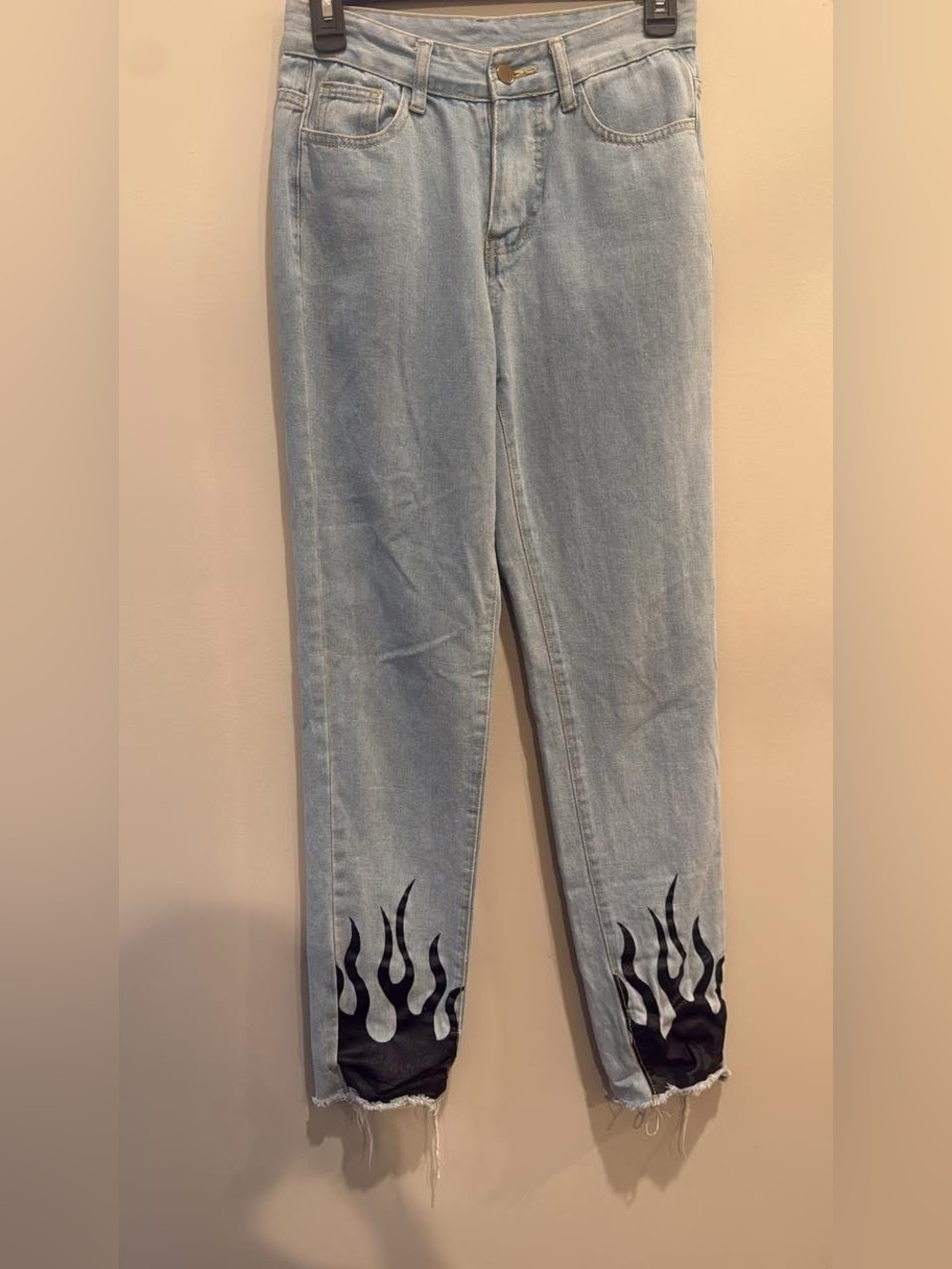 Light Wash Women's Jeans with Black Flame Hem